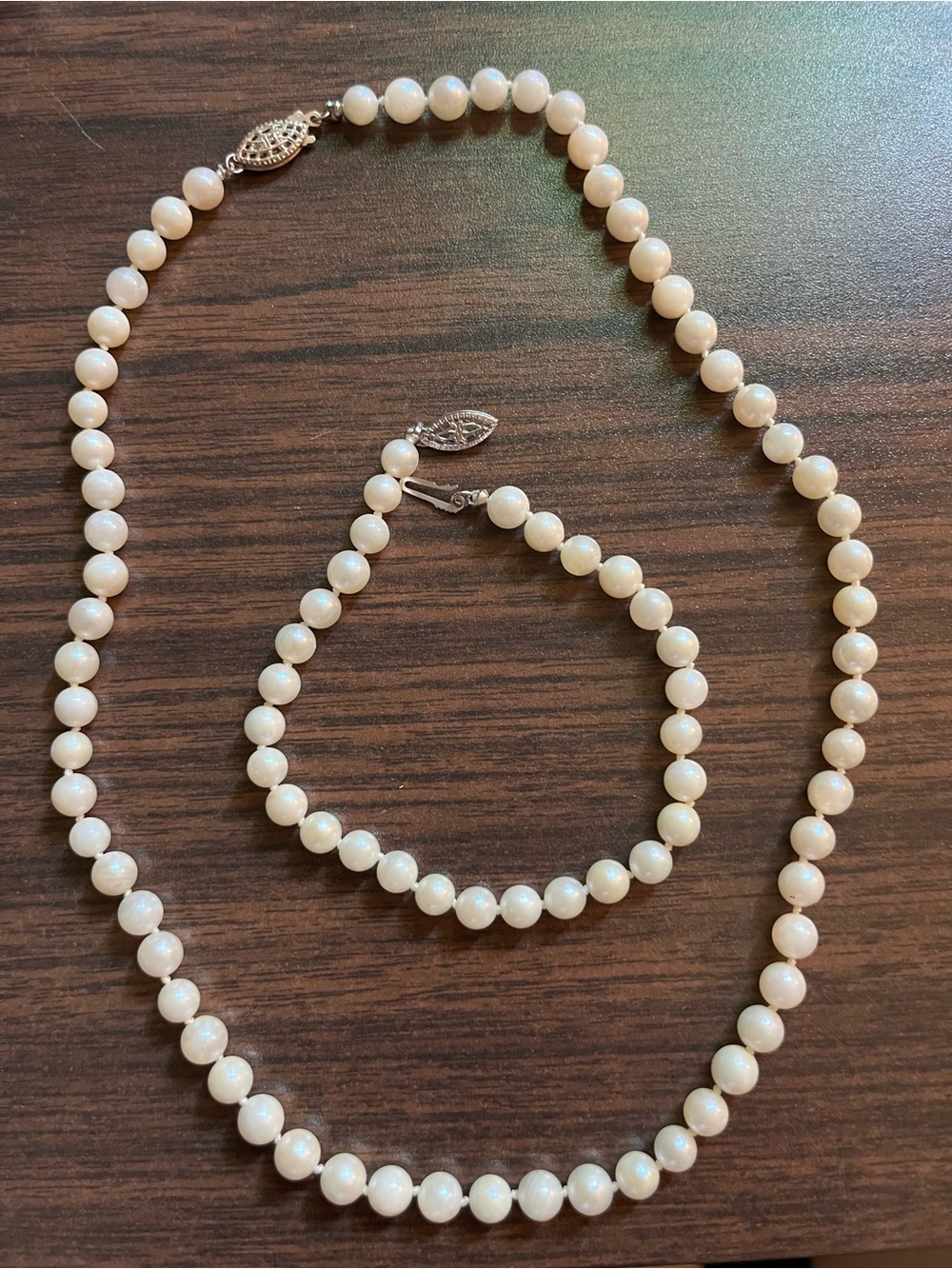 Genuine cultured pearl necklace with sterling clasp and matching bracelet